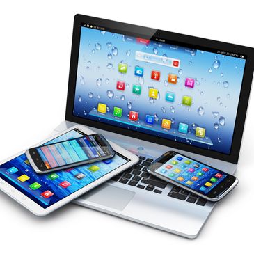 A photo of a tablet, 2 phones, and a laptop. the tablet, and 2 phones are sitting on the laptop. the laptop is sitting in a open state, with the other devices laying on it's keyboard.